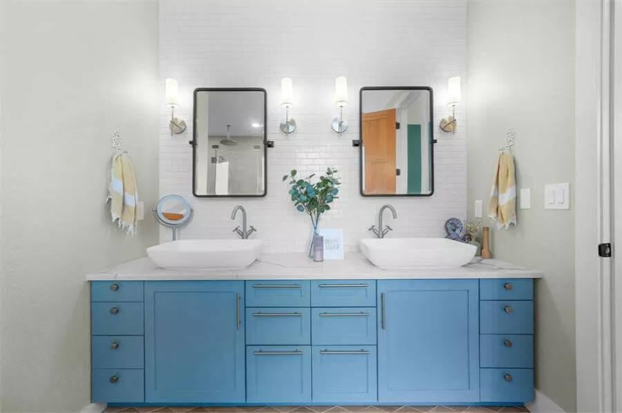 Bright and Breezy Bathroom with Eye-Catching Blue Vanities