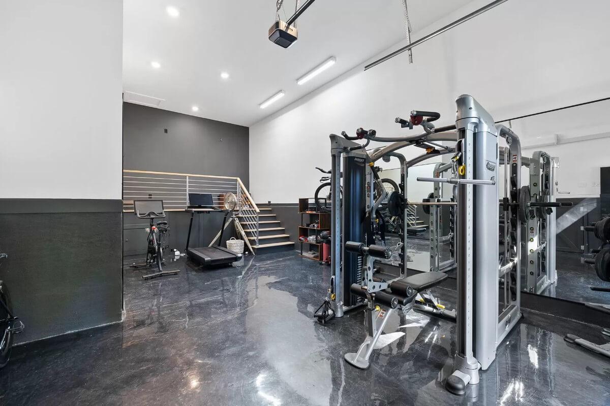 Check Out That Shiny Flooring in This Sleek Home Gym