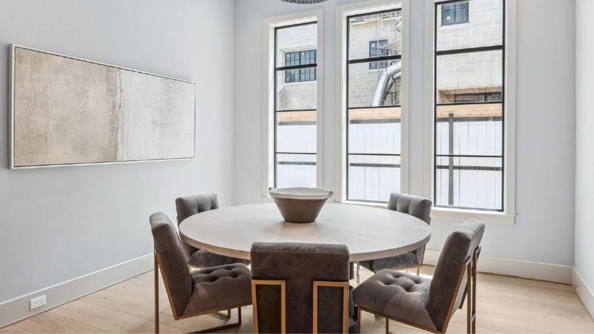 Notice the Plush Upholstered Chairs in This Minimalist Dining Nook