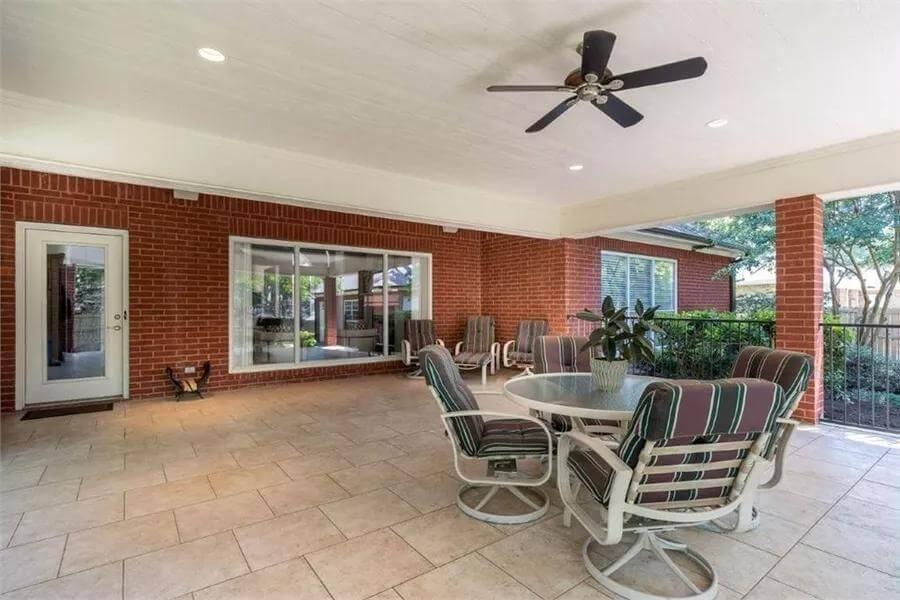 Look at This Expansive Covered Patio With Ceiling Fan for Comfort