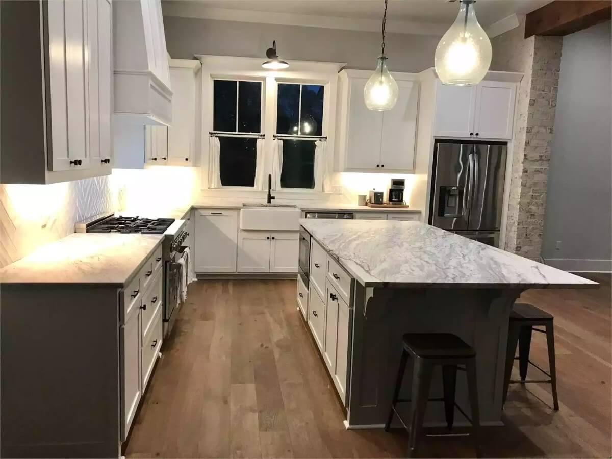Spacious Craftsman Kitchen with a Striking Marble Island