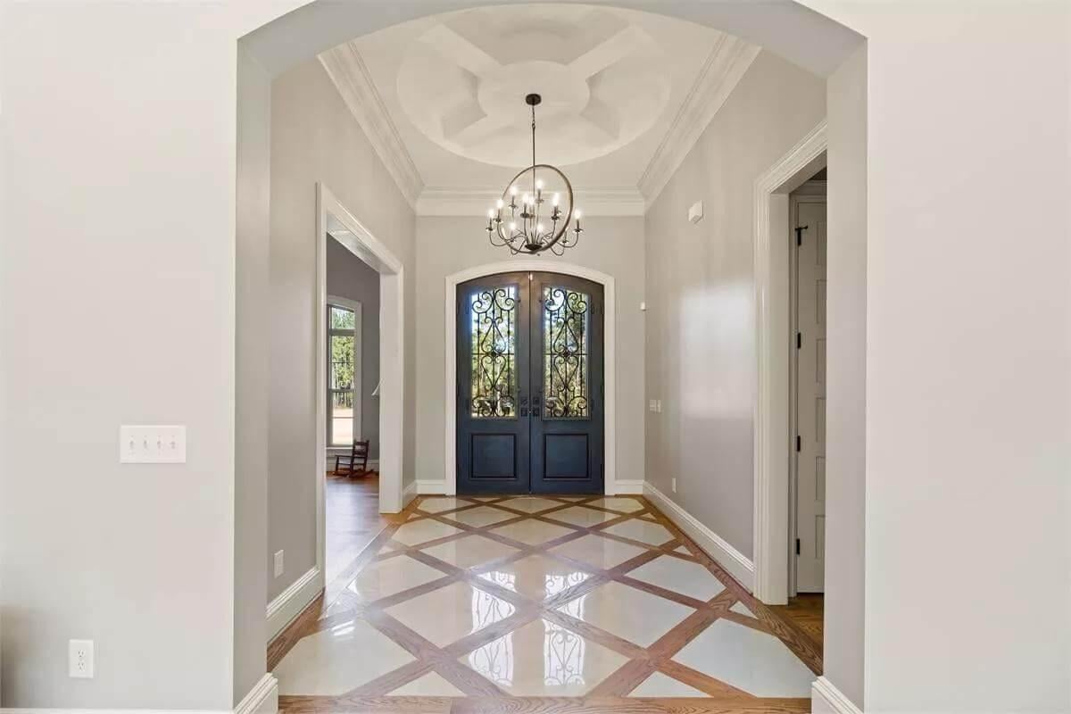 Check Out the Intricate Ceiling Medallion in This Elegant Entryway