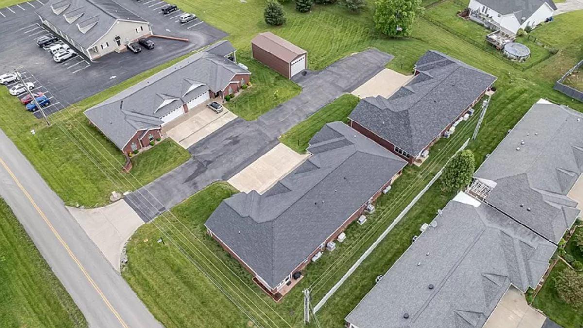 Aerial View of Harmonious Brick Complex with Ample Greenery