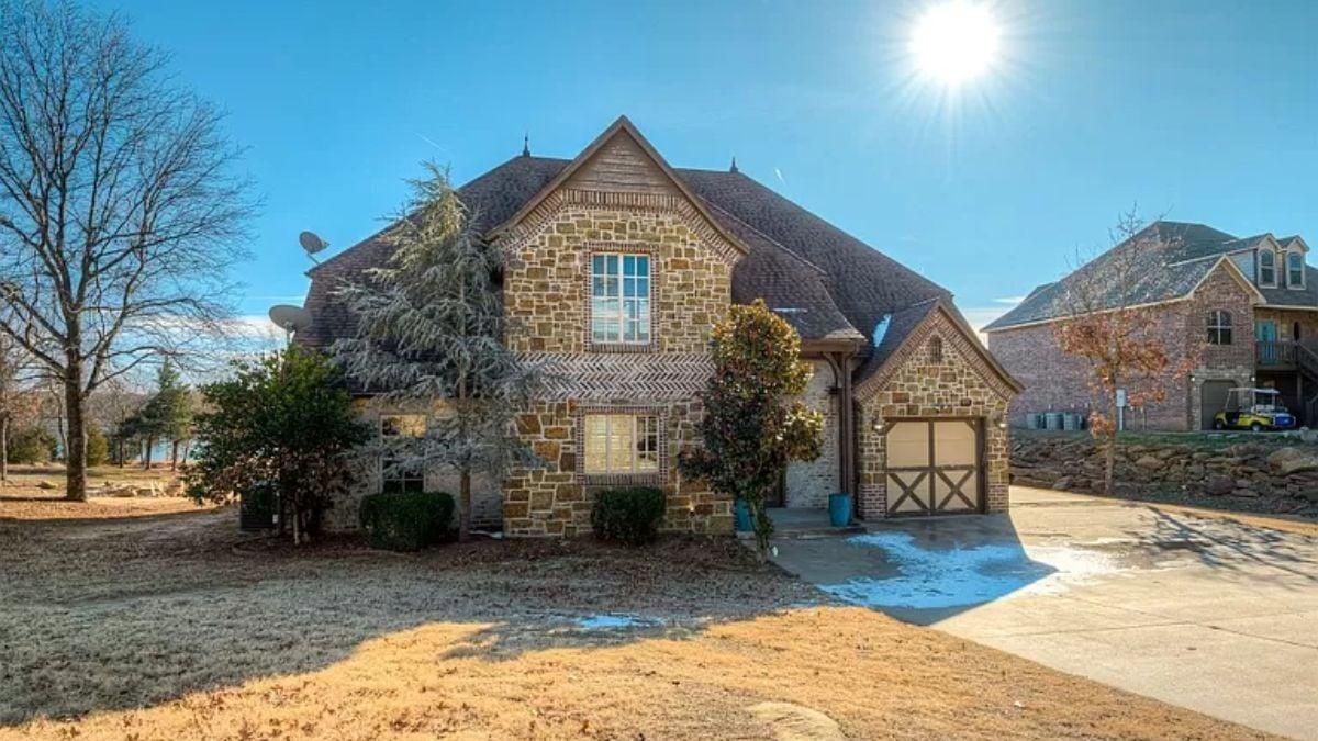 Stone Craftsmanship and Cozy Eaves Make a Statement