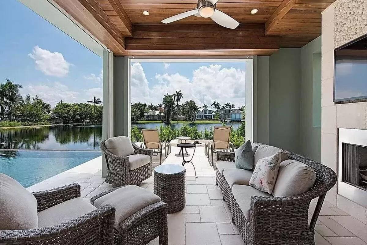Enjoy the Poolside Oasis With a Captivating Lake View