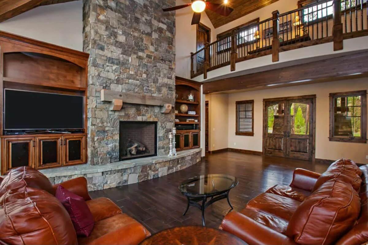 Rustic Living Room with a Stone Fireplace That Steals the Show