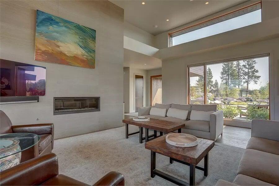 Modern Living Room with a Striking Fireplace and Artwork