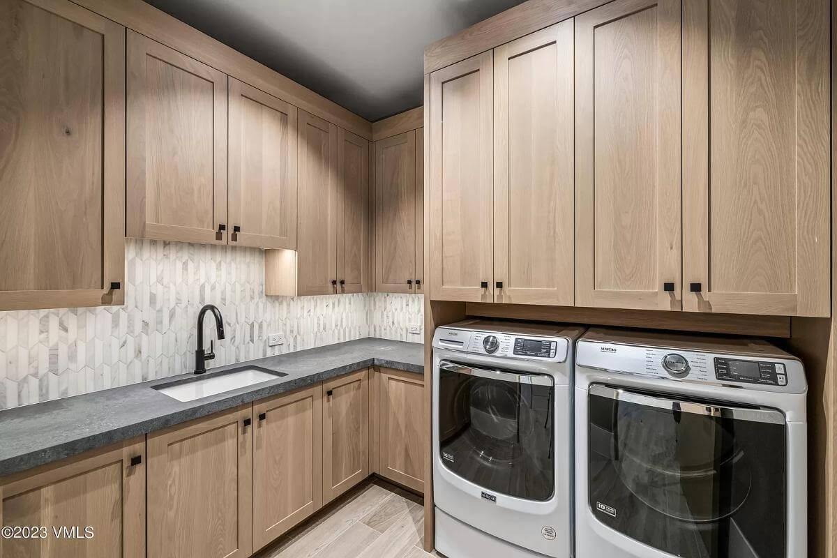 Look at Those Earthy Cabinets in This Functional Laundry Room