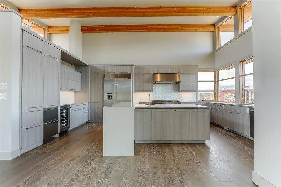 Contemporary Kitchen with High Ceilings and Exposed Beams