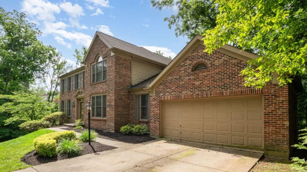 Classic Brick Two-Story with Iconic Garage Arch