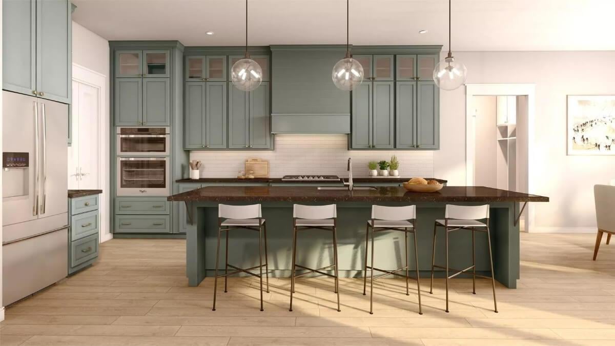 Marvel at the Elegant Sage Cabinetry in This Modern Kitchen