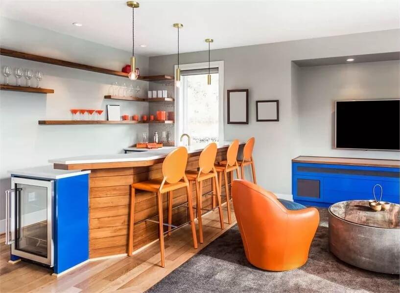 Bold Home Bar With a Splash of Orange and Open Shelving