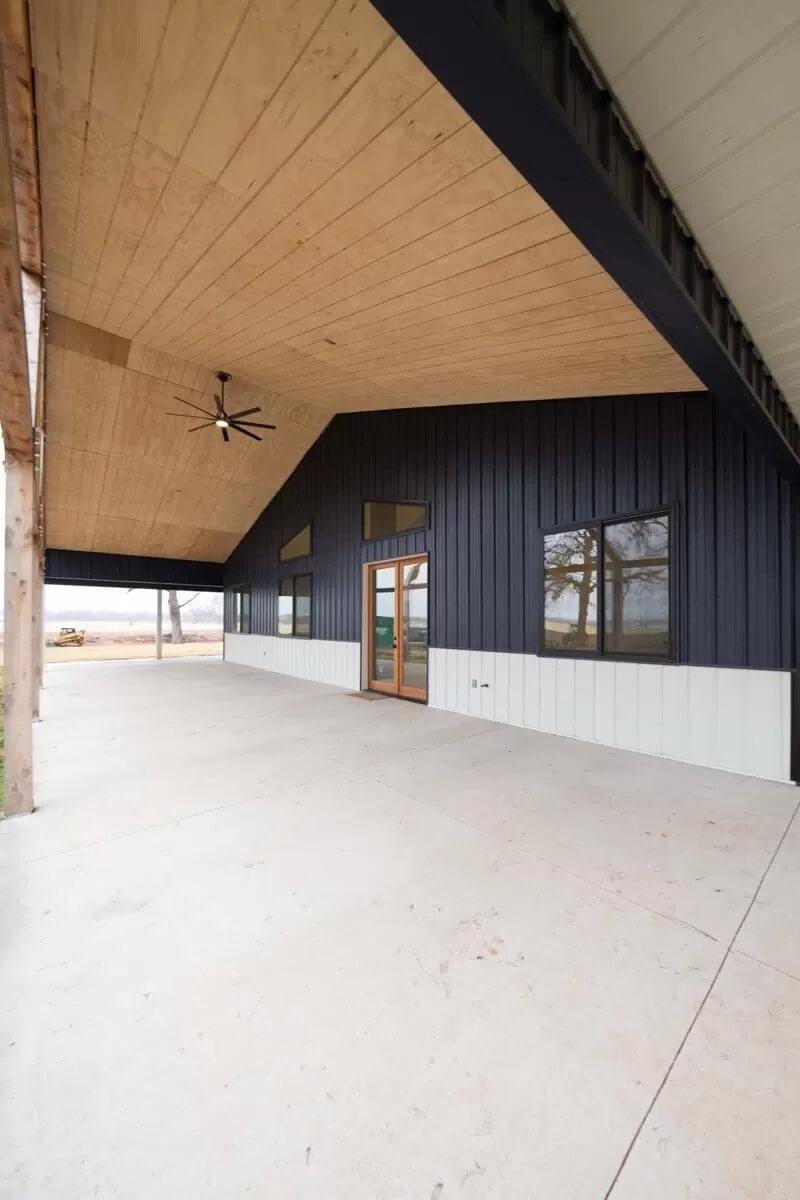 Check Out This Expansive Covered Patio with a Striking Ceiling Fan