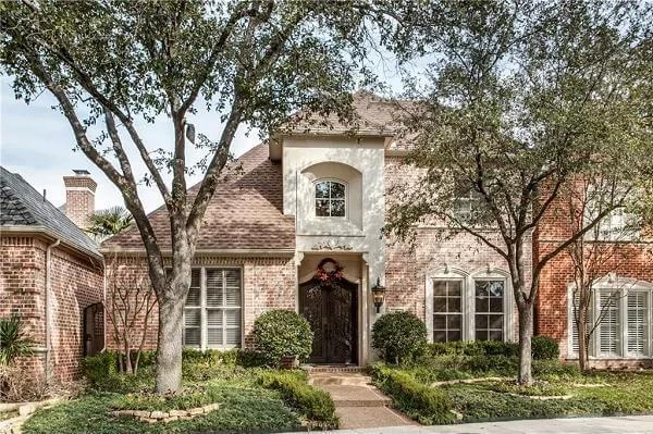 Charming Brick Facade with Elegant Arched Entryway