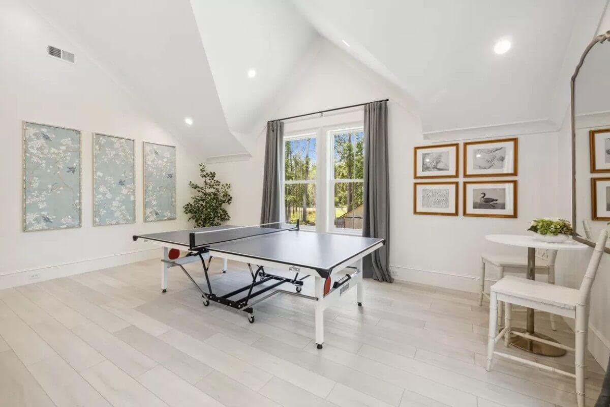 Check Out the Vaulted Ceiling in This Bright Game Room