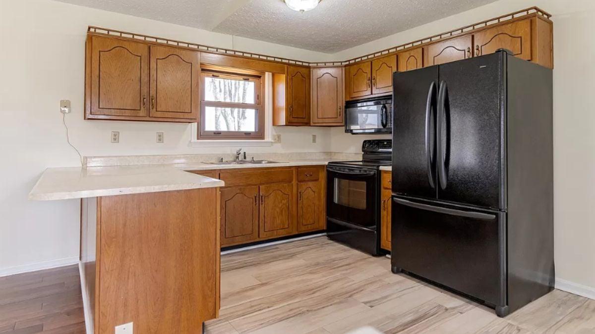 Notice the Classic Wood Cabinetry and Functional Layout in This Kitchen