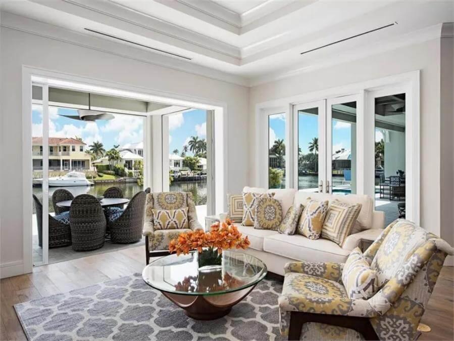 Canal-View Sitting Area with Intricate Ceiling Design