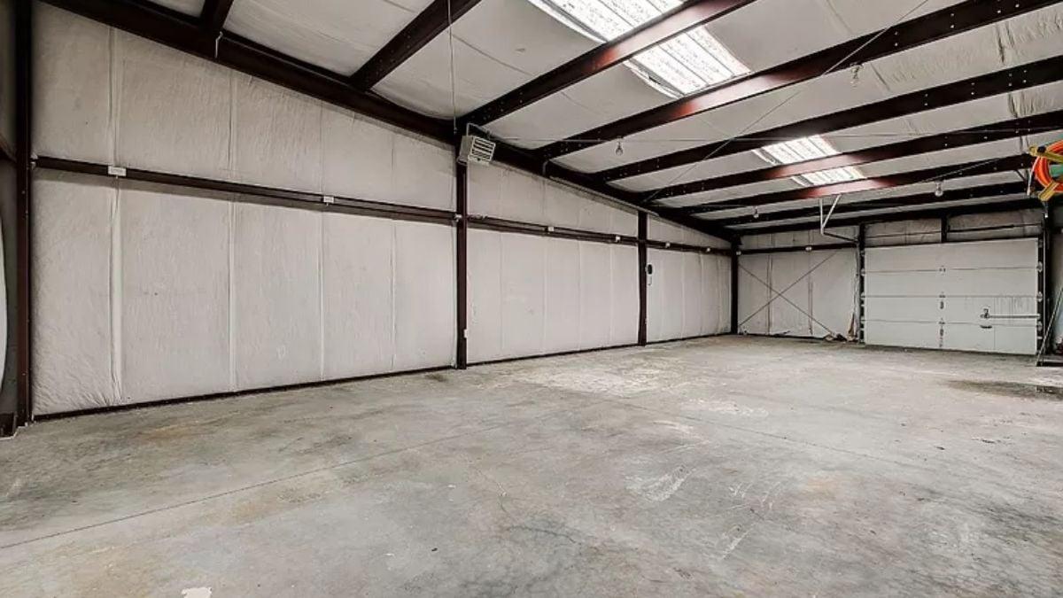Industrial-Style Garage with Ample Open Space and Skylights