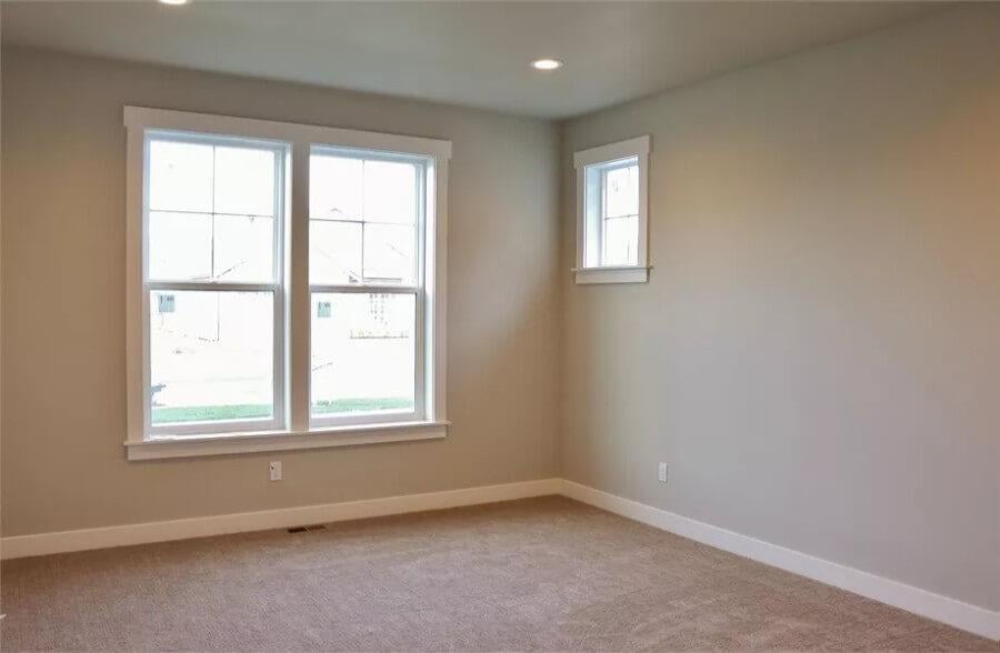 Sunlit Corner Bedroom With Classic Craftsman Windows