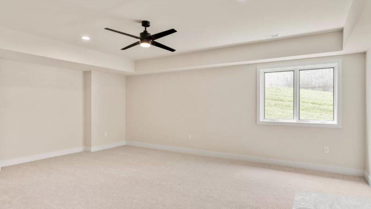 Notice the Sleek Ceiling Fan Against This Minimalist Space