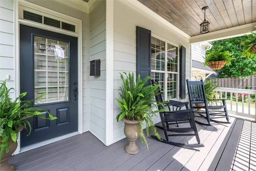 Classic Front Porch with Rocking ChairsโA Perfect Spot to Unwind