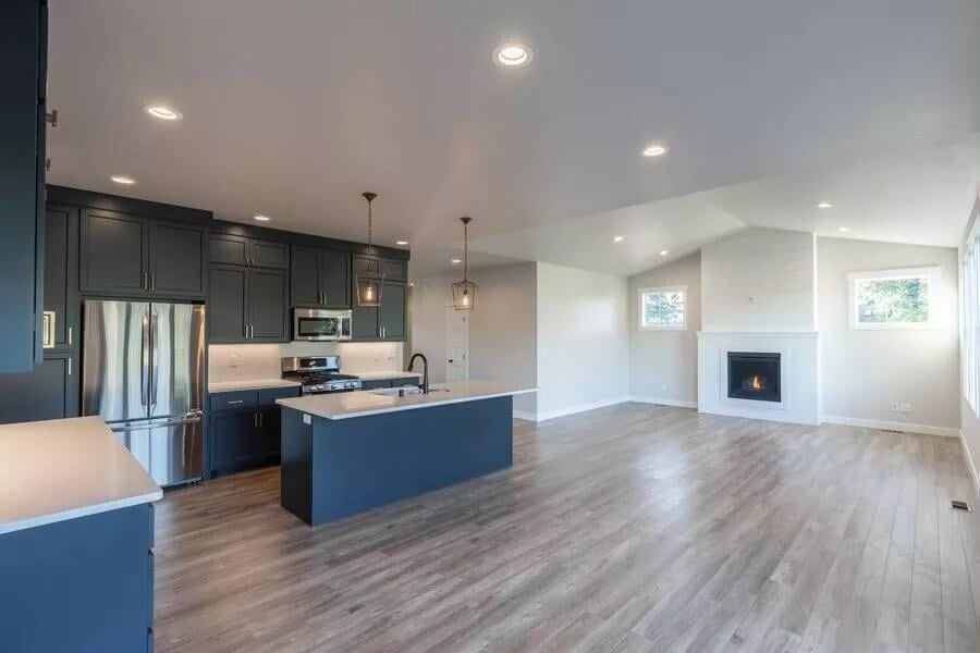 Spacious Craftsman Living Area with a Dark Cabinetry Twist