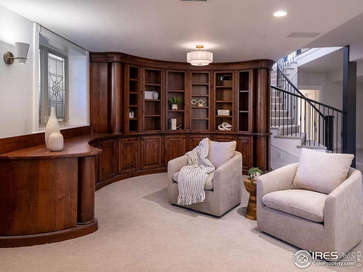 Notice the Custom Curved Bookshelves in This Cozy Nook