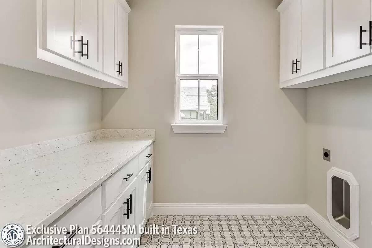 Spacious Laundry Room with Thoughtful Storage Solutions
