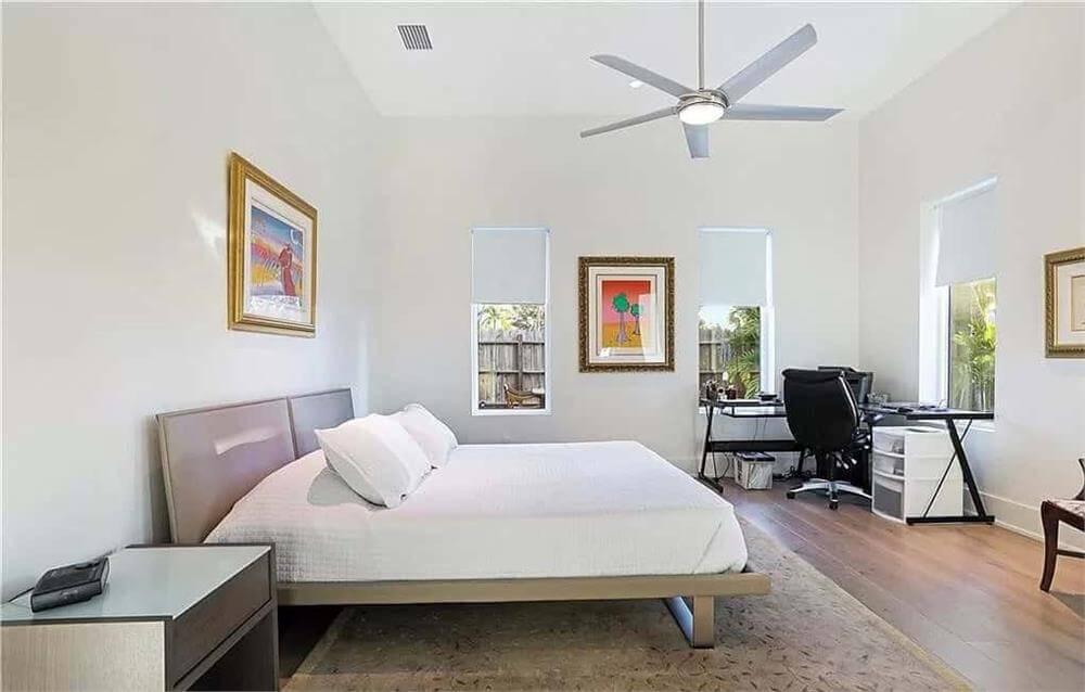Simple Bedroom with an Inviting Workspace