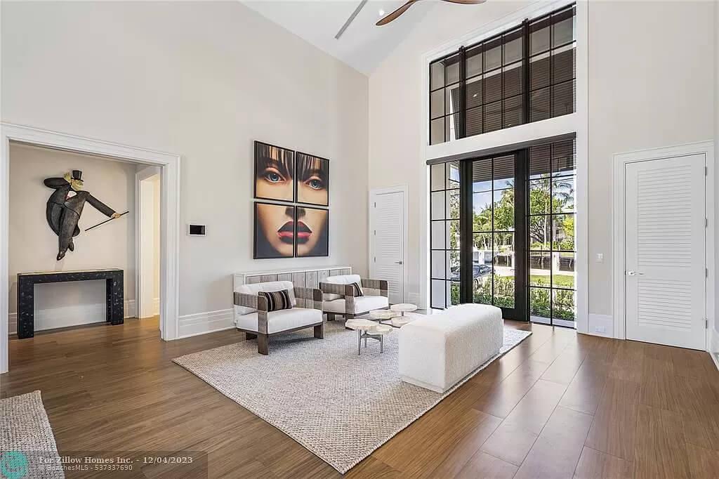 Notice the Striking Artwork Complementing the Lofty Ceilings