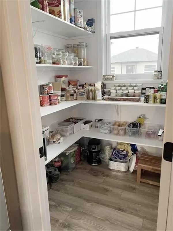 A Pantry with Thoughtful Shelving Keeps Things Organized