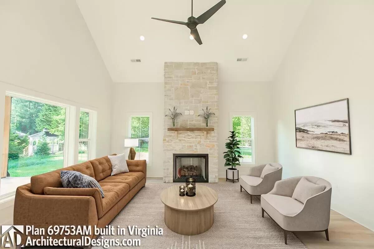 Modern Living Room with a Striking Stone Fireplace Feature