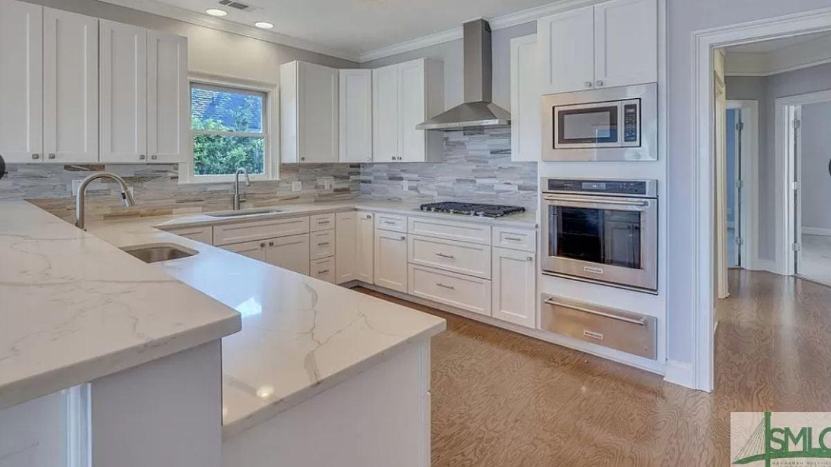 Notice the Elegant Marble Countertops in This Modern Kitchen