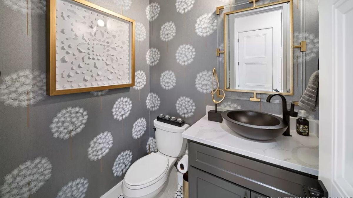 Check Out the Dandelion Wallpaper in This Chic Powder Room