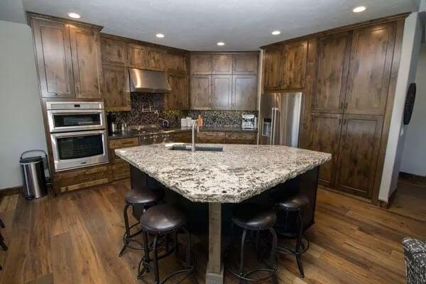Notice the Stunning Granite Island in This Craftsman Kitchen