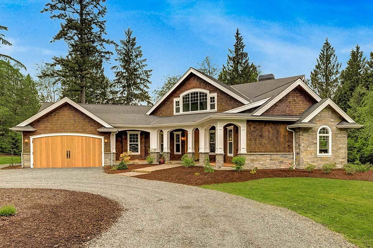 Classic Craftsman Home with a Charming Wooden Garage Door