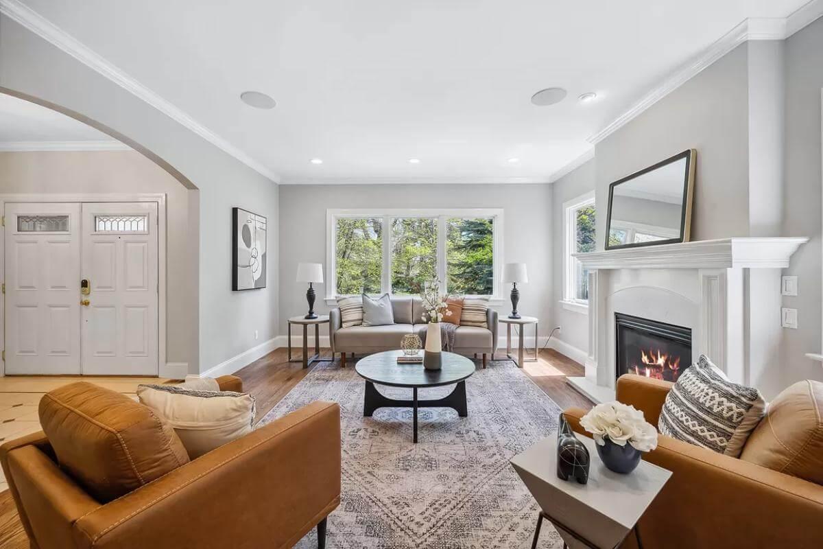 Bright Living Room Centered Around a Modern Fireplace