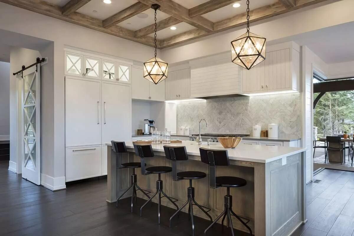 Notice the Stunning Geometric Pendant Lights Over This Sleek Kitchen Island