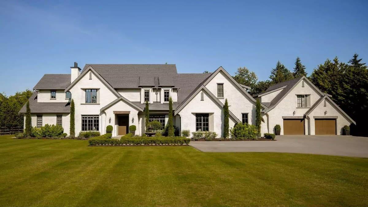 Check Out the Timeless Appeal of This Classic Estate with a Touch of Greenery