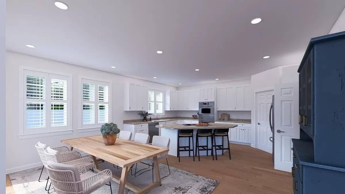 Bright Kitchen with Sleek Island and a Casual Dining Space