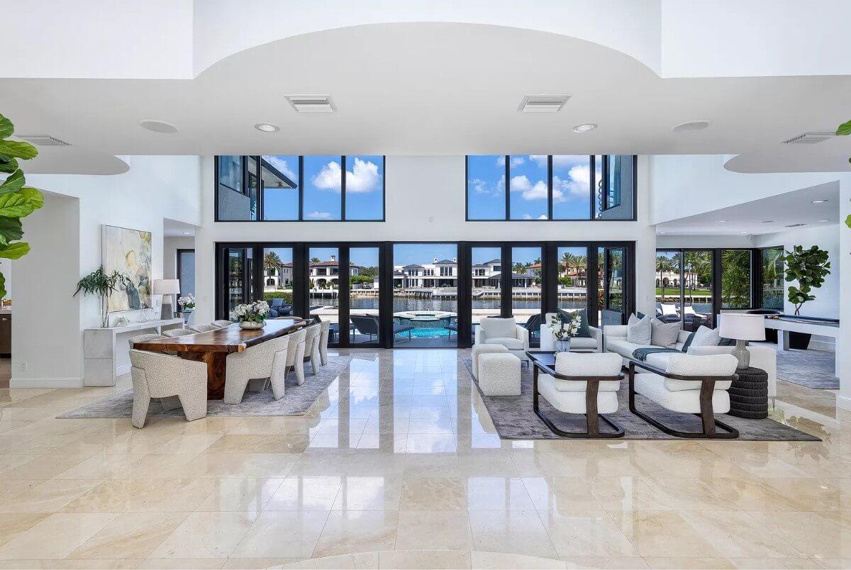 Wow, Check Out the Floor-to-Ceiling Windows in This Living and Dining Space