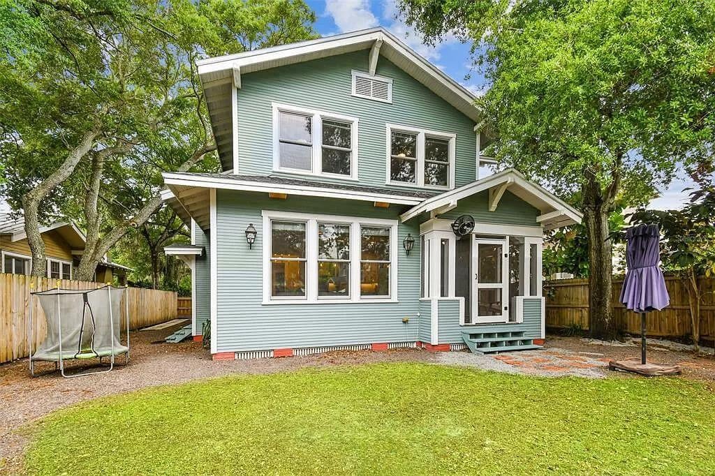 Look at How the Gable Roofs and Green Siding Add Character to This Craftsman Home