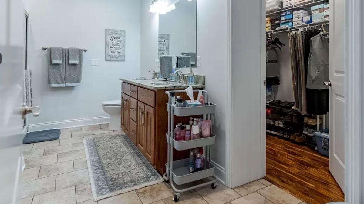 Bathroom with Granite Vanity and Functional Storage Solutions