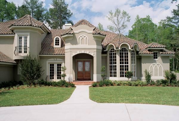 Mediterranean-Inspired Home with Striking Arched Windows