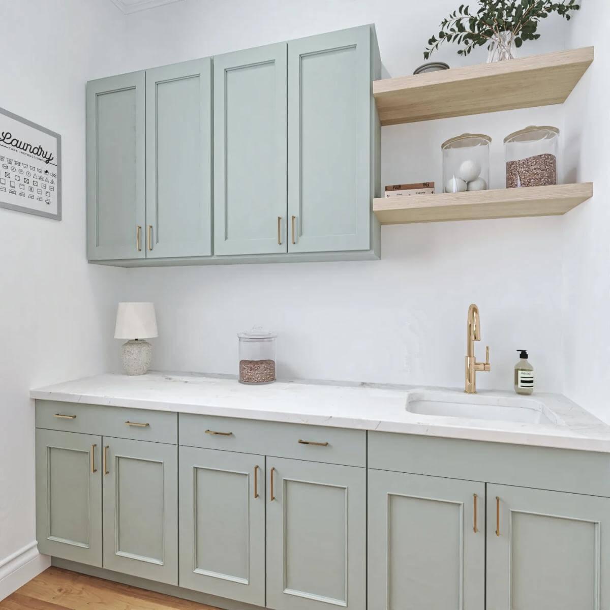 Laundry Room Sophistication with Subtle Sage Cabinetry