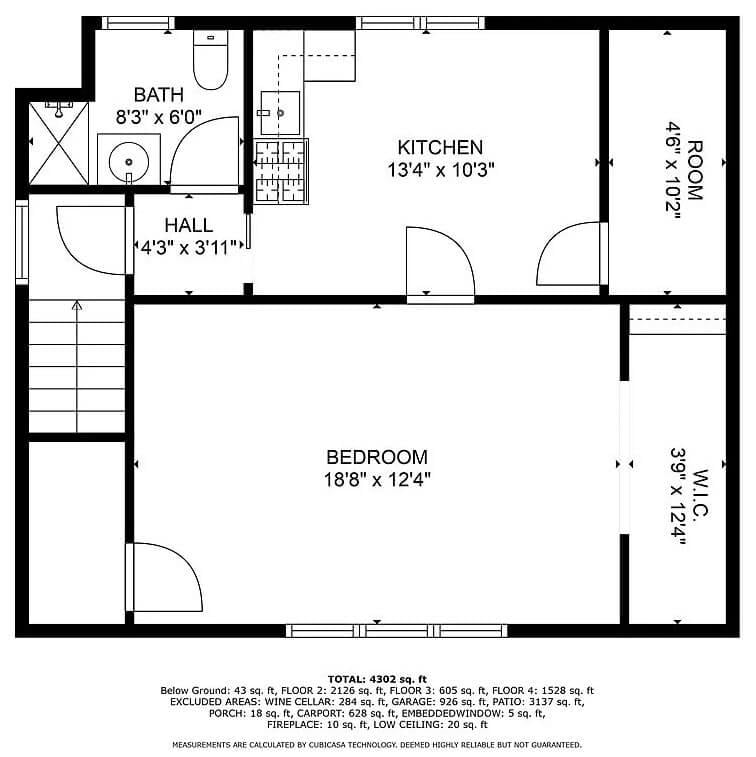 Compact Lower Level Perfect for Guests With Functional Kitchenette