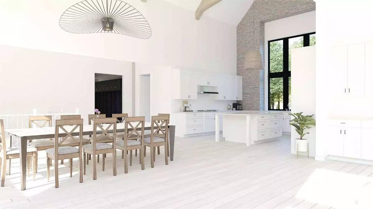 Expansive Open-Plan Kitchen and Dining with a Dramatic Pendant Light