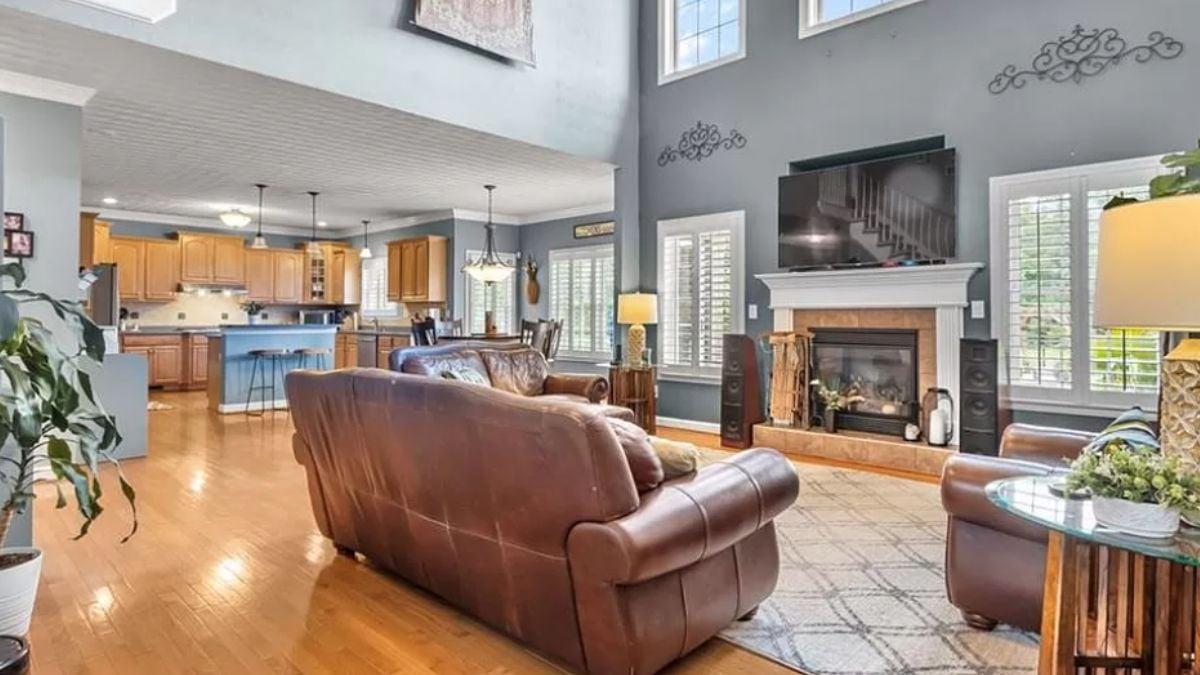 Open Living Room with Vaulted Ceilings and a Cozy Fireplace
