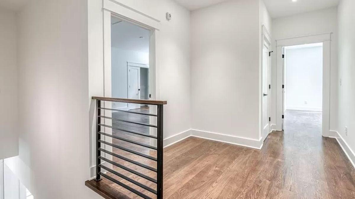 Modern Upper Hallway with Sleek Metal Railing