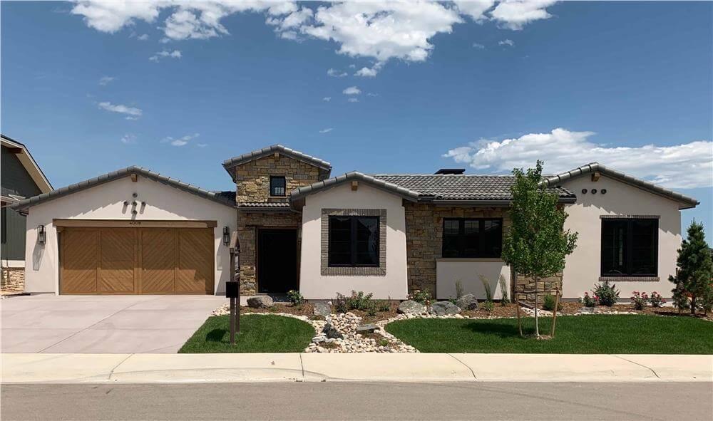 Check Out This Charming Stone Facade on a Modern Ranch Home